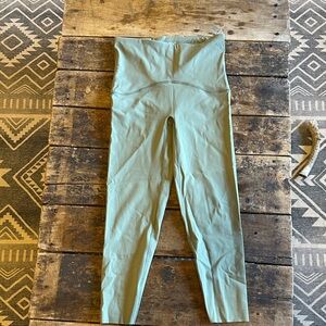 SPANX Booty Boost Leggings in Medium Petite. Sage green color.